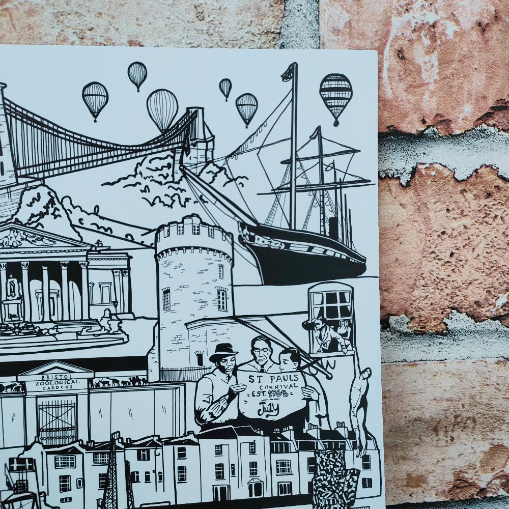 A square art print featuring a black and white hand-drawn illustration of St. Paul's Bay, with a suspension bridge, hot air balloons, a ship, buildings, and two men holding a sign, displayed against a rustic brick wall.